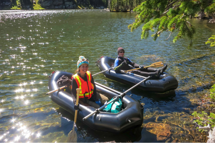 Bella Oleksy sampling from boat in RMNP