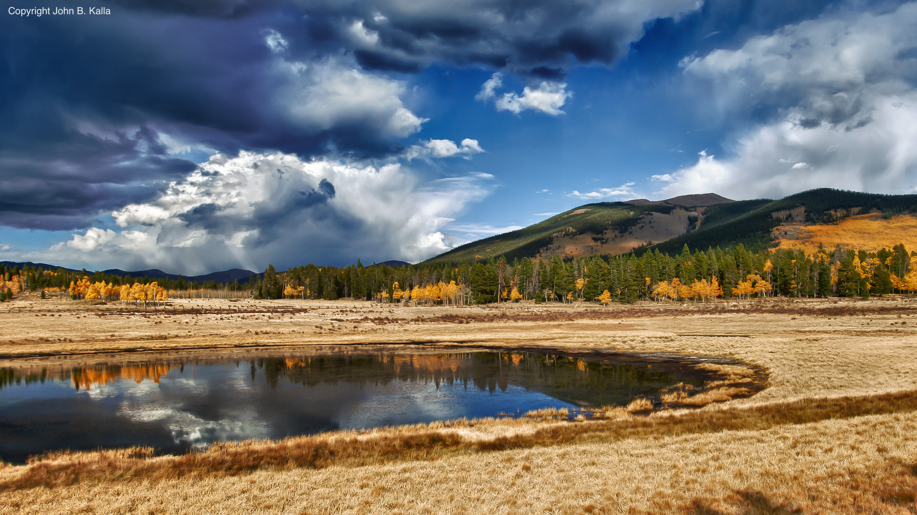 Colorado wetland under stormy skies