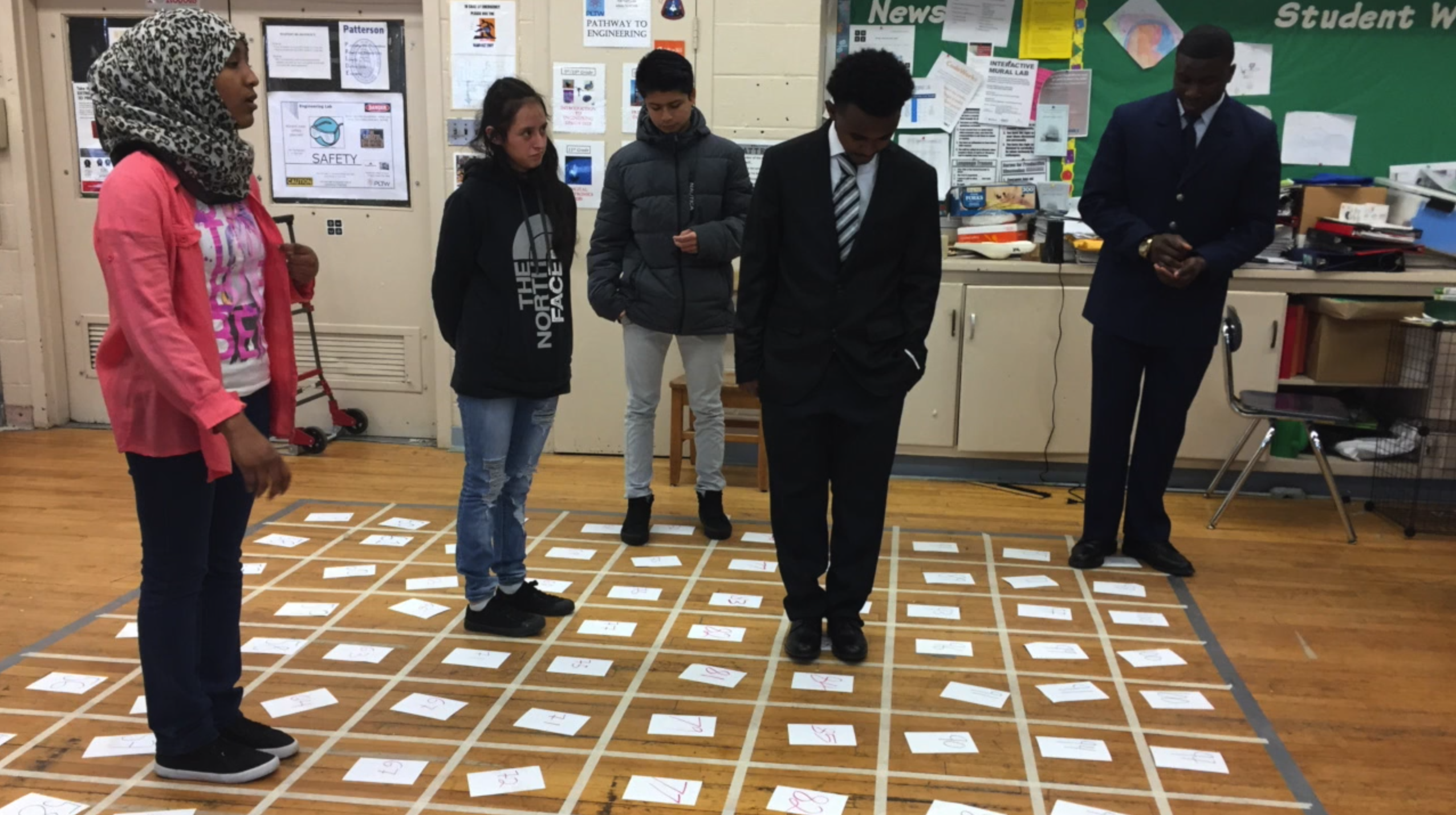 High school students physically act out how water moves
