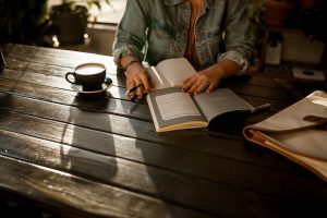 Image of women reading at a table