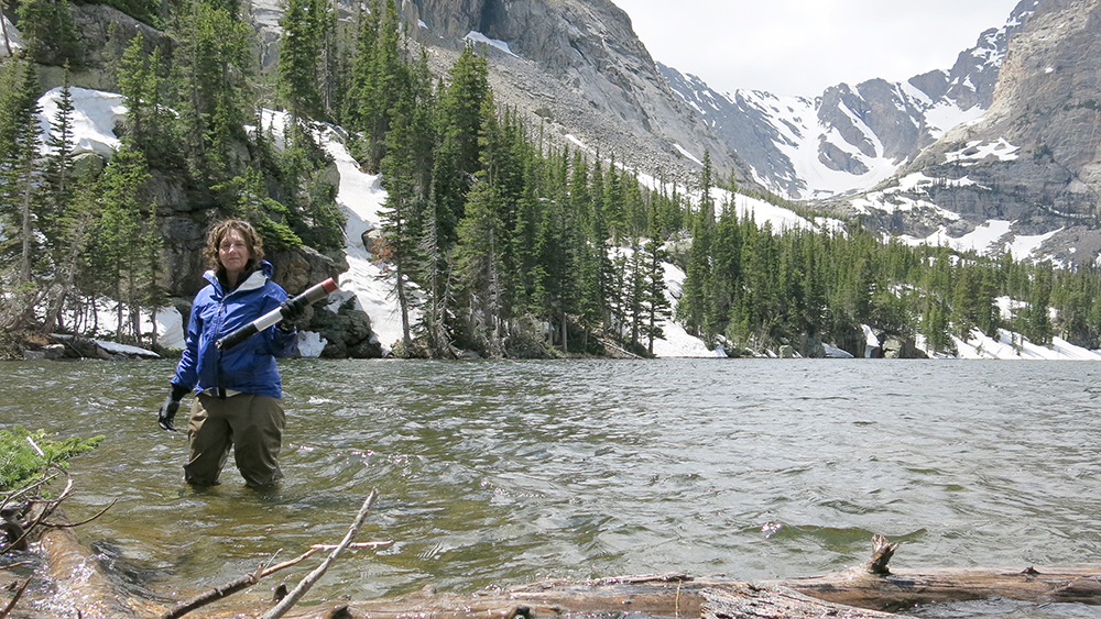 Jill Baron collecting samples at sky pond